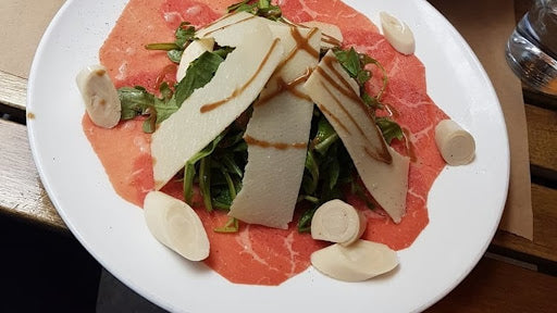 Carpaccio Di Manzo Con Rucola, Cuori Di Palma E Parmigiano