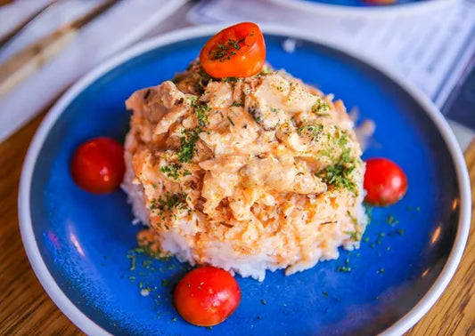 pulled rotisserie chicken over rice dinner Special 4-10PM